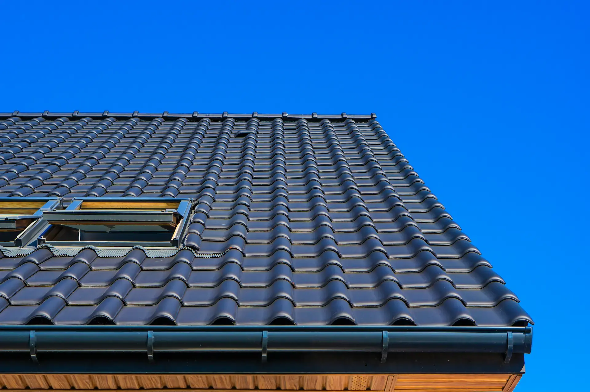 Vertical low angle closeup shot black roof building